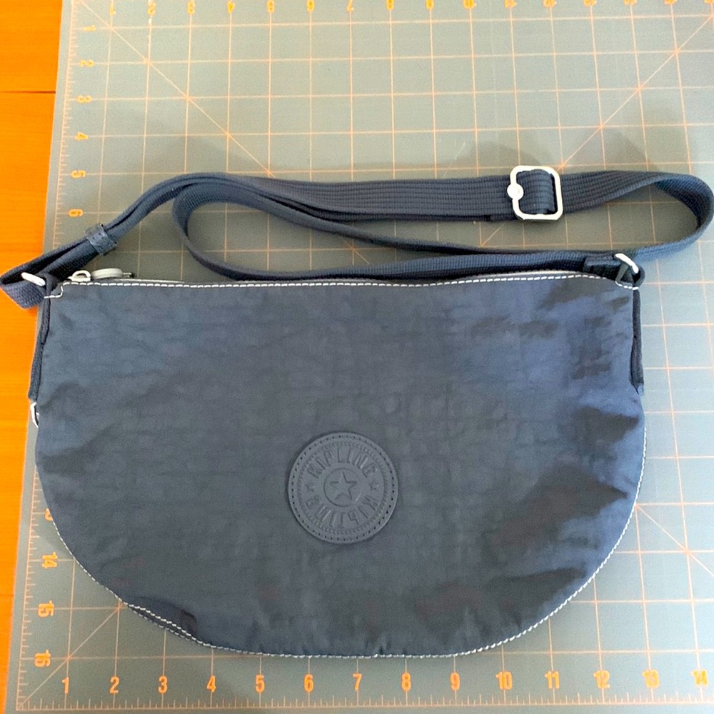 Kipling gray crossbody crescent bag